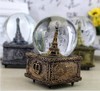 【家居摆件】。复古四方铁塔水晶球旋转雪花音乐盒 八音盒 商品缩略图0