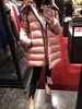 点此购买  女款 Moncler 小A娃娃版鹅绒羽绒服  亮 109935 商品缩略图0