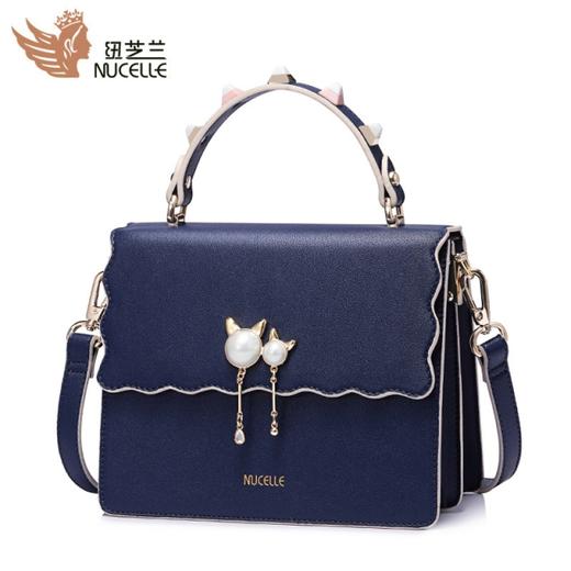 【一般贸易】【授权商品】纽芝兰（NUCELLE） 新款韩版猫咪珍珠女包 气质宝蓝 有夹层149 商品图0