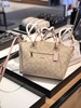 Coach樱花粉拼老花中号全皮饺子包 商品缩略图0