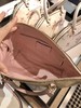 Coach樱花粉拼老花中号全皮饺子包 商品缩略图2
