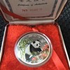 1997年1盎司熊猫彩色银币一枚 商品缩略图0
