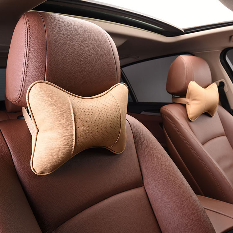 汽车头枕一对装 车载车用皮革打孔护颈枕靠枕 四季骨头枕双面皮革