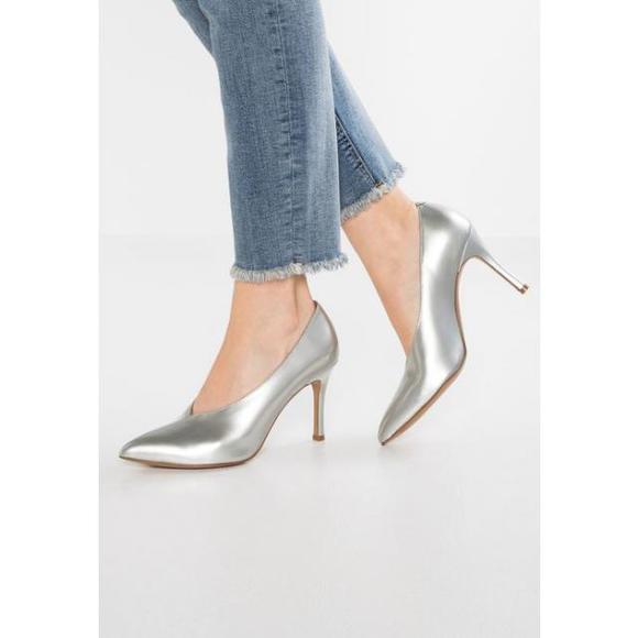 凯尼斯.柯尔(美国时尚品牌) Kenneth Cole New