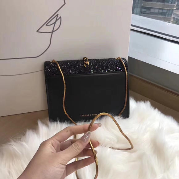 小ck亮片流苏包