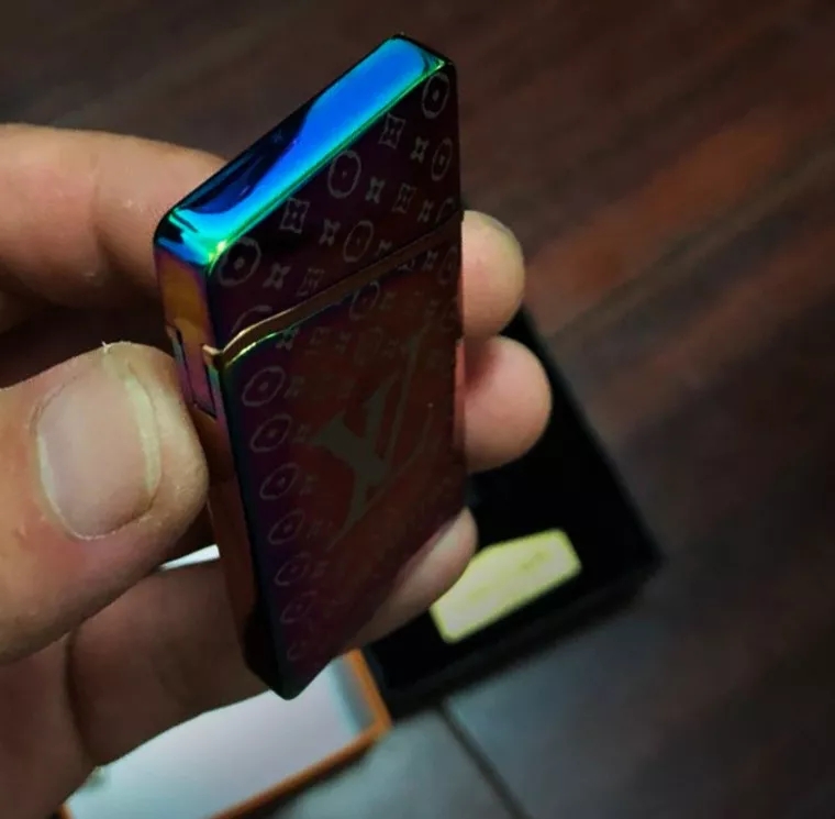 lv高端礼品双镜面电镀炫彩充电感应点火螺旋电弧电子打火机!