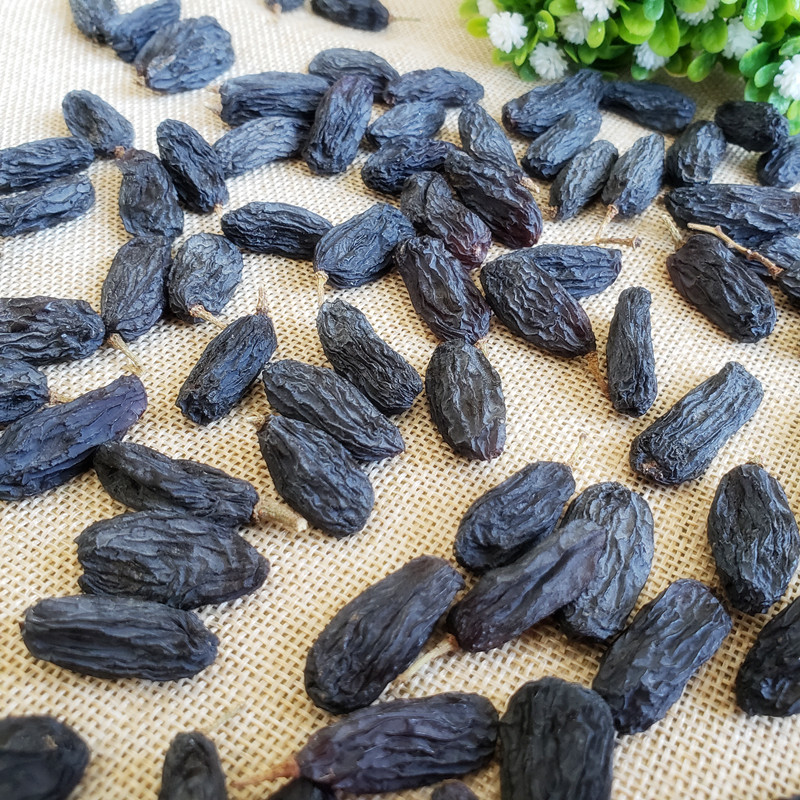 新疆产黑提子干吐鲁番特级超大免洗黑加仑葡萄干500g包邮新货干果