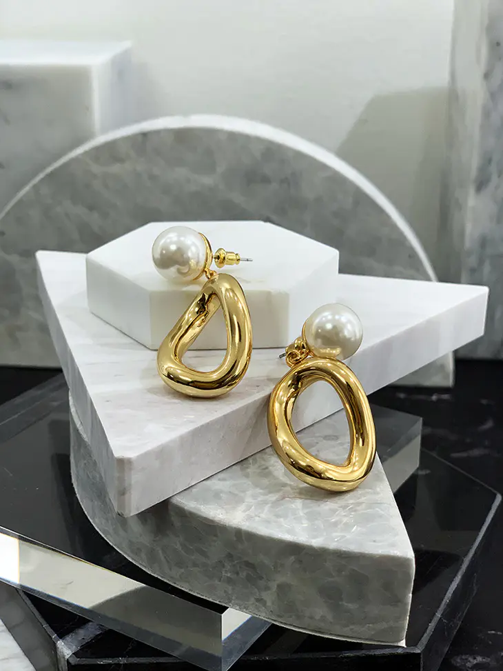 asymetric earring with pearl stud