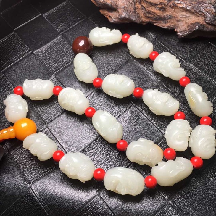 【90837】新疆和田玉籽料十八罗汉手持件