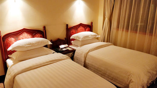 金山宾馆舒适四人套房双早优惠价 商品图0