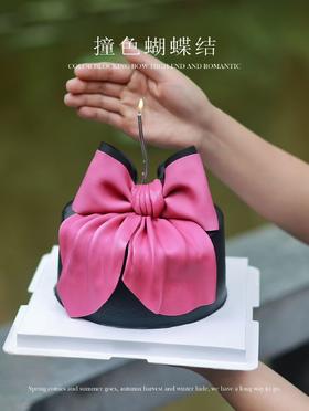 撞色蝴蝶结（建议刮掉黑色奶油部分再食用）