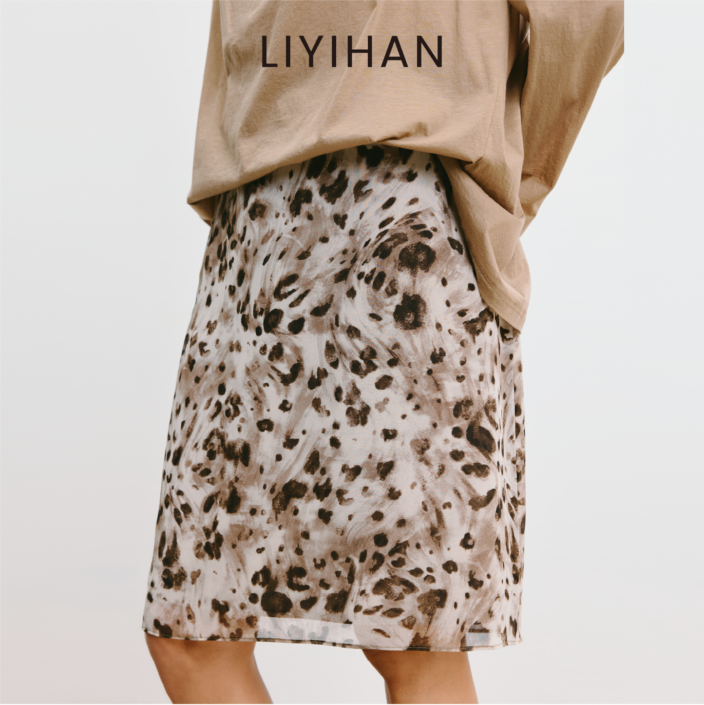 LIYIHAN 豹纹半身裙2025秋新款女设计感小众A字裙老钱风收腰裙子