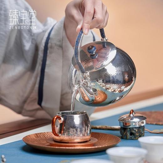 臻宝堂银壶 999纯银煮茶壶纯手工锤纹布袋烧水壶大漆提梁泡壶中式臻宝堂布袋壶(规矩锤纹)950ml 商品图4