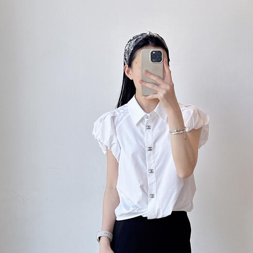 女装新款 设计荷叶边无袖小衫 商品图0