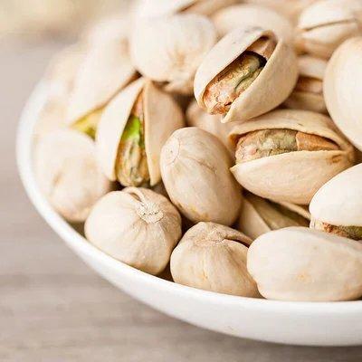 原味开心果270g，原料选用W240颗粒饱满大而均匀，自然原色，无漂白，低温烘培技术，用40°-90°烘培6-24小时烘干水份。 商品图3