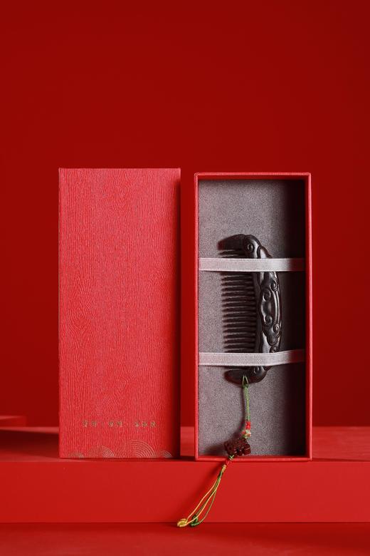 LP0134-1°如意纹半月型木梳 商品图0