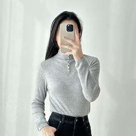 小众设计感半高领羊毛针织衫女秋冬新款纽扣修身弹力内搭打底上衣