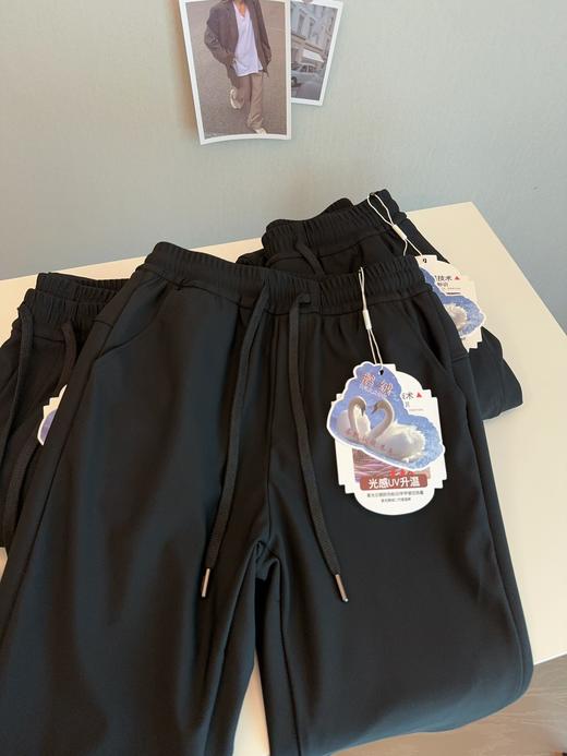 冬季光感UV锁温90白鹅绒纯色加绒保暖锥形小直筒羽绒裤棉裤情侣装 商品图7