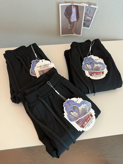 冬季光感UV锁温90白鹅绒纯色加绒保暖锥形小直筒羽绒裤棉裤情侣装 商品图1